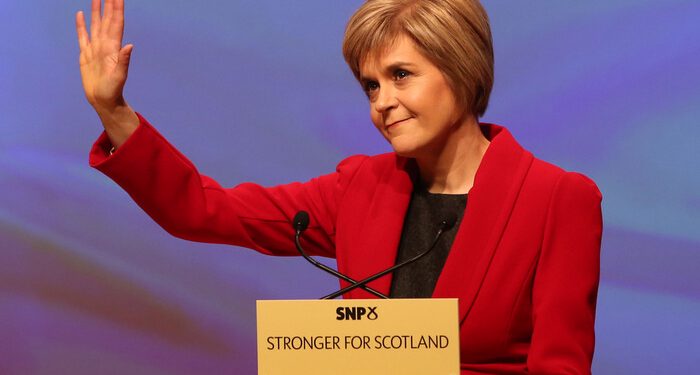Newly appointed SNP leader Nicola Sturgeon gestures to the audience during her speech at the annual party conference at Perth Concert Hall, Scotland.