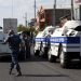 Policemen block a street after a group of armed men seized a police station along with an unknown number of hostages, according the country's security service, in Yerevan, Armenia, July 17, 2016. REUTERS/Melik Baghdasaryan/Photolure EDITORIAL USE ONLY. NO RESALES. NO ARCHIVE