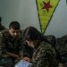To follow a story on YPG fighters striking ISIS position by Rukmini Callimachi - Hasaka, Syria - July 31, 2015: YPG fighters check maps and location as they coordinate one air strike on ISIS position inside Hasaka, at a YPG headquarters on the outskirts of Hasaka. CREDIT: Photo by Mauricio Lima for The New York Times                              NYTCREDIT: Mauricio Lima for The New York Times