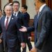 Russian President Vladimir Putin, left, Chinese President Xi Jinping, center, and U.S. President Barack Obama are seen arriving at the the Asia-Pacific Economic Cooperation (APEC) Summit plenary session at the International Convention Center, Yanqi, Tuesday, Nov. 11, 2014 in Beijing. (AP Photo/Pablo Martinez Monsivais, Pool)