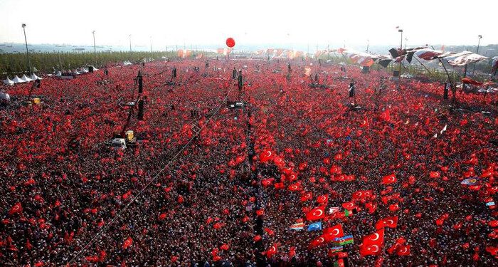 This handout picture released by the Turkey's Presidential Press Service and taken on August 7, 2016 shows people waving Turkish national flags as they gather on at Kizilay Democracy Square in Ankara during a rally against failed military coup on July 15. Hundreds of thousands of people gathered in Istanbul today for a pro-democracy rally organised by the ruling party, bringing to an end three weeks of demonstrations in support of President Recep Tayyip Erdogan after last month's failed coup. / AFP PHOTO / TURKEY'S PRESIDENTIAL PRESS SERVICE AND AFP PHOTO / YASIN BULBUL / RESTRICTED TO EDITORIAL USE - MANDATORY CREDIT "AFP PHOTO / TURKEY'S PRESIDENTIAL PRESS SERVICE / YASIN BULBUL" - NO MARKETING - NO ADVERTISING CAMPAIGNS - DISTRIBUTED AS A SERVICE TO CLIENTS YASIN BULBUL/AFP/Getty Images