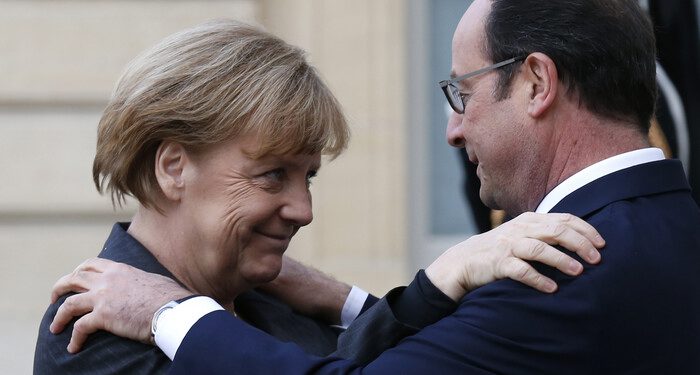 French President Francois Hollande (R) welcomes Germany's Chancellor Angela Merkel as she arrives at the Elysee Palace before the solidarity march (Rassemblement Republicain) in the streets of Paris January 11, 2015. French citizens will be joined by dozens of foreign leaders, among them Arab and Muslim representatives, in a march on Sunday in an unprecedented tribute to this week's victims following the shootings by gunmen at the offices of the satirical weekly newspaper Charlie Hebdo, the killing of a police woman in Montrouge, and the hostage taking at a kosher supermarket at the Porte de Vincennes.     REUTERS/Pascal Rossignol (FRANCE  - Tags: CRIME LAW POLITICS CIVIL UNREST SOCIETY)   - RTR4KWCH