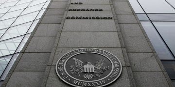 FILE- In this file photo made Dec. 17, 2008, shows the exterior of the Securities and Exchange Commission (SEC) headquarters in Washington. Federal regulators filed civil fraud charges against an investment adviser and his firm in connection with complex securities tied to mortgages during the housing market bust. (AP Photo/File)