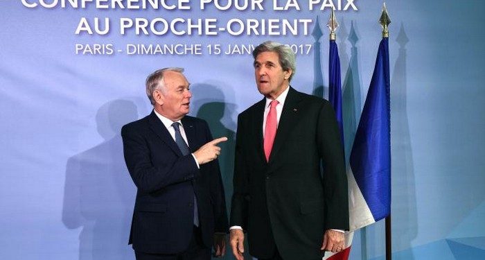 French Minister of Foreign Affairs Jean-Marc Ayrault welcomes US Secretary of State John Kerry as he arrives for the Mideast peace conference in Paris, France, January 15, 2017. REUTERS/Bertrand Guay/POOL