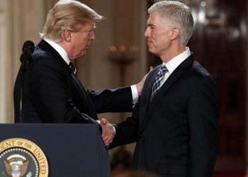 President Donald Trump shakes hands with 10th U.S. Circuit Court of Appeals Judge Neil Gorsuch, his choice for Supreme Court Justices in the East Room of the White House in Washington, Tuesday, Jan. 31, 2017. (AP Photo/Carolyn Kaster)