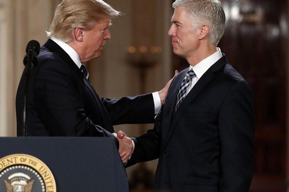 President Donald Trump shakes hands with 10th U.S. Circuit Court of Appeals Judge Neil Gorsuch, his choice for Supreme Court Justices in the East Room of the White House in Washington, Tuesday, Jan. 31, 2017. (AP Photo/Carolyn Kaster)