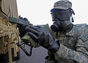 U.S. Army Spc. Jerame Smalls of Mount Pleasant, a chemical operations specialist from the 108th Chemical Company, S.C. Army National Guard in North Charleston, S.C., checks a vehicle for radiation at the first station during a vehicle decontamination exercise in support of Ardent Sentry, May 19, 2013. The S.C. National Guard is participating in a major NORAD and USNORTHCOM training exercise called Ardent Sentry, May 17-21, 2013. It involves a scenario of a hurricane striking the South Carolina coast, requiring more than 1,500 members of the S.C. National Guard to practice disaster response activities and coordination procedures. (U.S. Army National Guard photo by Sgt. Erica Knight/Released)