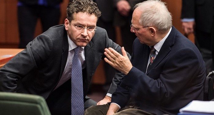 German Finance Minister Wolfgang Schaeuble, right, speaks with Dutch Finance Minister Jeroen Dijsselbloem during a meeting of Eurogroup finance ministers at the EU Council building in Brussels, Monday, Feb. 16, 2015. Greeces radical left government and its European creditors headed into new talks Monday on the debt-heavy countrys stuttering bailout program, but expectations are low despite a fast-approaching deadline for some kind of deal. (AP Photo/Geert Vanden Wijngaert)