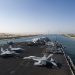 160708-N-QN175-009 SUEZ CANAL (July 8, 2016) - The aircraft carrier USS Dwight D. Eisenhower (CVN 69) approaches the Friendship Bridge as it transits the Suez Canal. The Eisenhower Carrier Strike Group is deployed in support of maritime security operations and theater security cooperation efforts in the U.S. 5th Fleet area of operations. (U.S. Navy photo by Mass Communication Specialist Seaman Dartez C. Williams/Released)
