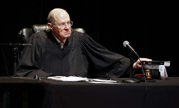 January 31, 2011: U.S. Supreme Court Justice Anthony Kennedy presides over arguments at "The Trial of Hamlet," a Shakespeare Center of Los Angeles representation of Hamlet's trial with a jury of 12 community members, including actors, high school students, philanthropists and Los Angeles dignitaries at the University of Southern California Bovard Auditorium in Los Angeles on Monday, Jan. 31, 2011. (AP Photo/Damian Dovarganes)
