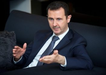 Syria's president Bashar al-Assad gestures during an interview with French daily Le Figaro in Damascus in this handout distributed by Syria's national news agency SANA on September 2, 2013.  REUTERS/SANA/Handout (SYRIA - Tags: CONFLICT CIVIL UNREST POLITICS ) ATTENTION EDITORS - THIS IMAGE WAS PROVIDED BY A THIRD PARTY. FOR EDITORIAL USE ONLY. NOT FOR SALE FOR MARKETING OR ADVERTISING CAMPAIGNS. THIS PICTURE IS DISTRIBUTED EXACTLY AS RECEIVED BY REUTERS, AS A SERVICE TO CLIENTS