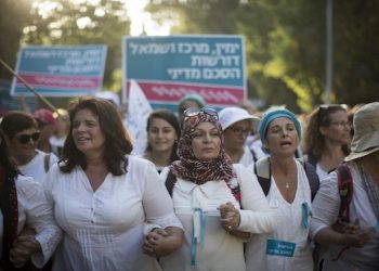 Thousands of women from the 'Women Wage Peace' movement take part in a march in support of peace  in Jerusalem on October 19, 2016. The women have been marching across the country over the past two weeks, culminating in a march from the Knesset to the Prime Minister's House in Jerusalem, demanding a peace agreement between Israel and the Palestinians. Photo by Hadas Parush/Flash90