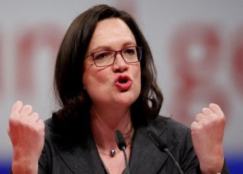 BERLIN, GERMANY - DECEMBER 07: Andrea Nahles (R), leader of the of the German Social Democrats (SPD) Bundestagsfaction, speaks at the SPD federal party congress on December 7, 2017 in Berlin, Germany. SPD delegates are meeting for the three-day congress to elect party leadership and also to vote on whether to pursue coalition negotiations with the German Christian Democrats (CDU/CSU). The CDU and CSU had pursued coalition talks with the German Greens Party and the Free Democratic Party (FDP), though those talks collapsed in November. Schulz and other SPD leaders had vowed the party would not seek a coalition with the Christian Democrats and would instead remain in the opposition following federal elections last September, though the November coalition talks collapse has led many in the SPD to reconsider. (Photo by Carsten Koall/Getty Images)