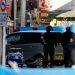 Policemen stand next to a car which plowed into pedestrians on New Year day in Tokyo, Japan, January 1, 2019. REUTERS/Kim Kyung-Hoon