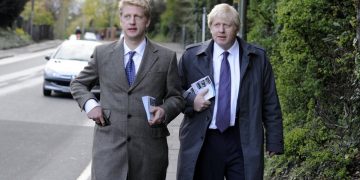 The Mayor Boris Johnson with his brother Jo Johnson MP For Orpington out campaigning on the streets of on their way to a rally in Orpington to support Boris's Mayoral Campaign, during his Mayoral campaign,  Tuesday April 17, 2012. Photo By Andrew Parsons/i-Images