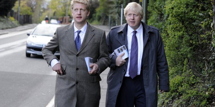 The Mayor Boris Johnson with his brother Jo Johnson MP For Orpington out campaigning on the streets of on their way to a rally in Orpington to support Boris's Mayoral Campaign, during his Mayoral campaign,  Tuesday April 17, 2012. Photo By Andrew Parsons/i-Images