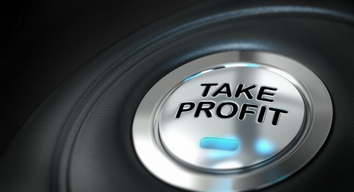 take profit button over black background with blur effect, market investment, conceptual image