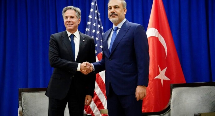 U.S. Secretary of State Antony Blinken and Turkey's Foreign Minister Hakan Fidan greet each other in New York, Friday, Sept. 22, 2023.   (Bing Guan/Pool Photo via AP)