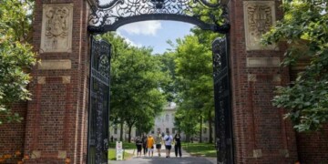 CAMBRIDGE, MASSACHUSETTS - JUNE 29:  People walk through the gate on Harvard Yard at the Harvard University campus on June 29, 2023 in Cambridge, Massachusetts. The U.S. Supreme Court ruled that race-conscious admission policies used by Harvard and the University of North Carolina violate the Constitution, bringing an end to affirmative action in higher education.  (Photo by Scott Eisen/Getty Images)