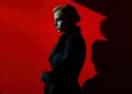 Female Russian Spy Emerging from Shadows