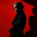 Female Russian Spy Emerging from Shadows