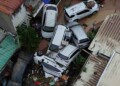 Cars are piled on top of each other after flooding caused by Typhoon Kalmaegi in Cebu city, central Philippines, Tuesday, Nov. 4, 2025. (AP Photo/Jacqueline Hernandez)