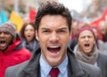 photo of happy corporate executive in business suit surrounded by angry protestors --ar 2:1 --profile 7u4vife --v 7 Job ID: 9d9715a8-403c-468b-89c1-f07770ca2f17